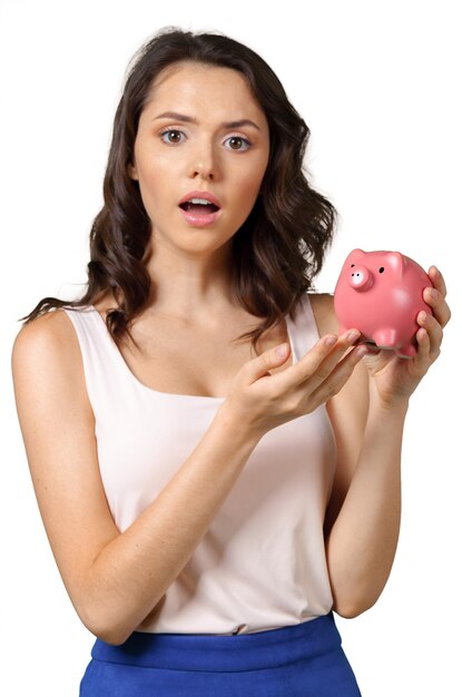 Young brunette with piggy bank.