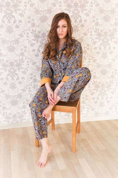 Young brunette woman relaxing at home