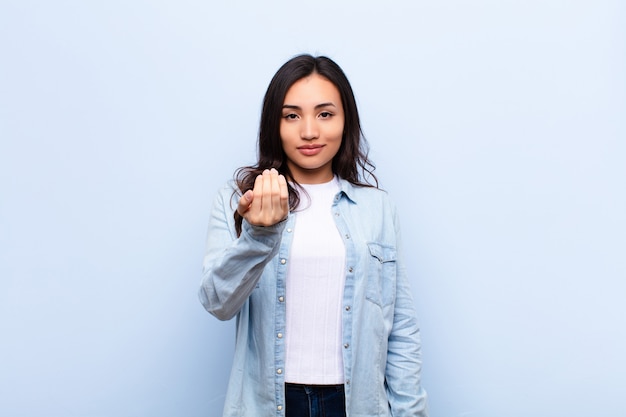 young brunette woman welcoming