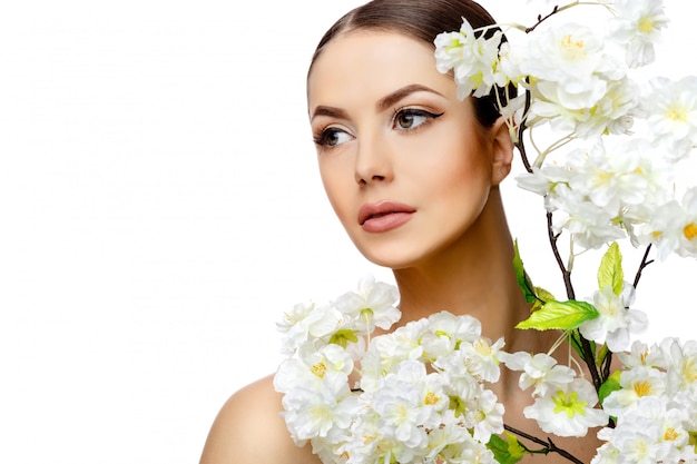 Young brunette woman with beautiful clean skin