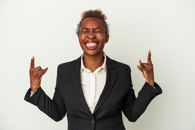 Young business african american woman isolated on white background showing rock gesture with fingers