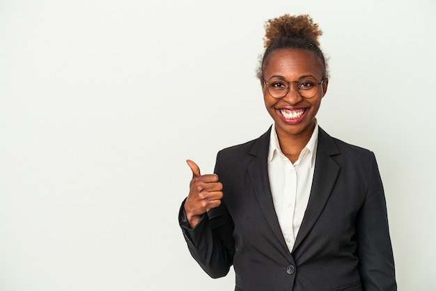 young business african american woman isolated on white background smiling and raising thumb up