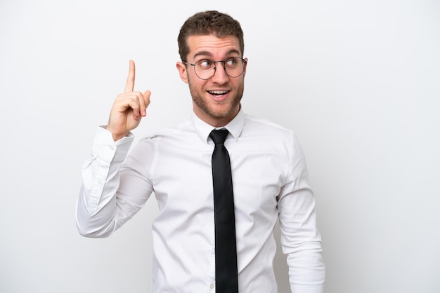 Young business caucasian man isolated on white background intending to realizes the solution while lifting a finger up