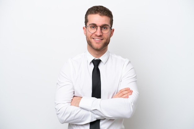 Young business caucasian man isolated on white background keeping the arms crossed in frontal position