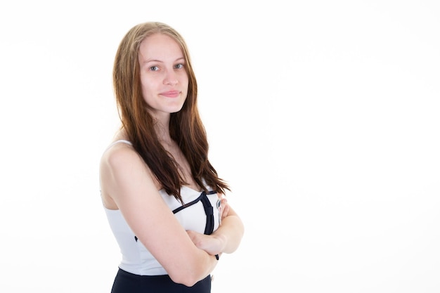 Young business caucasian woman isolated against a white background folded arms crossed smiling and cheerful