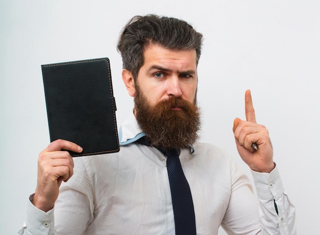 Photo young business man the business office work concept young businessman isolated on white background cheerful financial advisor with beard having idea manager holding folder with document