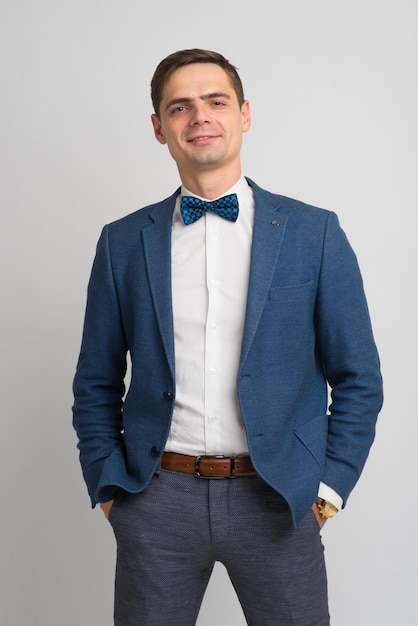 Young business man full body isolated on a white and green background