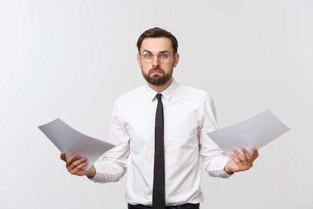 young business man serious writing on clipboard, Handsome businessman wear elegant suit and tie isolated over white wall.