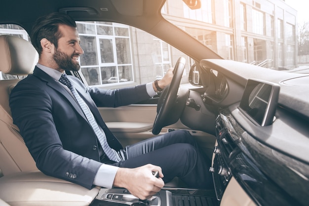 Young business man test drive new car