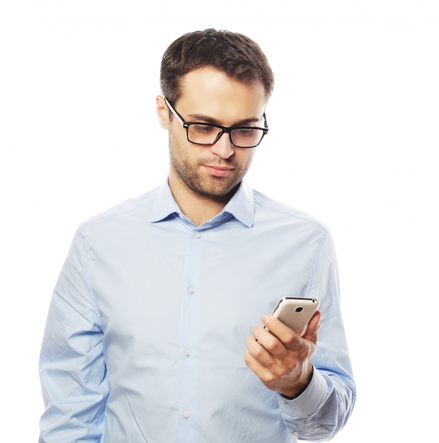 Young business man using mobile phone.