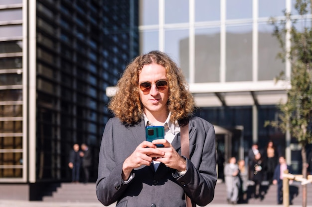 Young business man using mobile phone