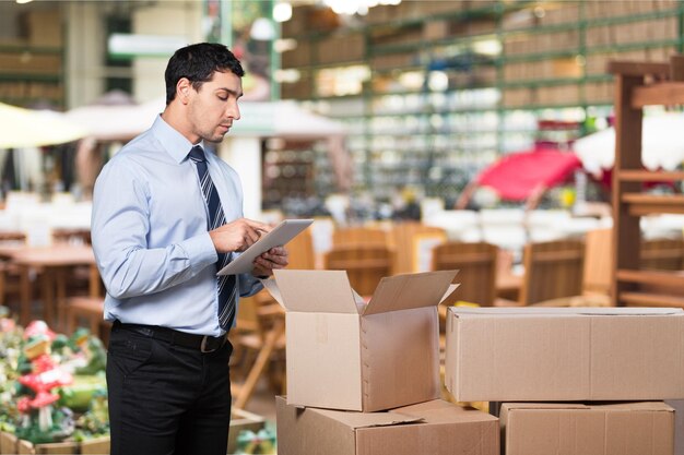 Young business man using tablet pc