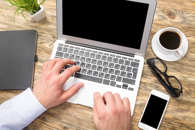 Young business man work with laptop in office