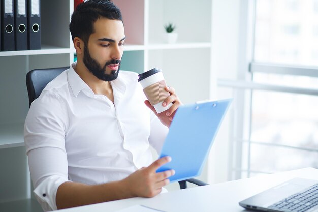 Young Business Man Working On Computer In Office