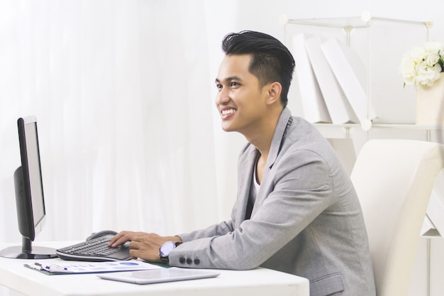 Young business owner at his office