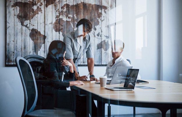 Young business people in formal clothes working in the office.