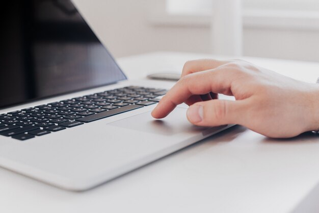 Young business person man working with notebook at workplace