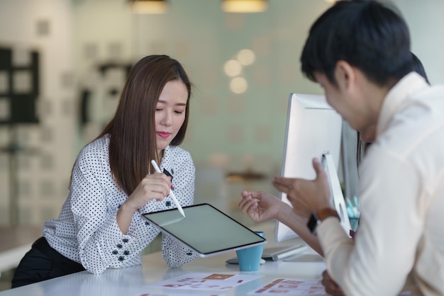 Young business team working with business report document on office desk Brainstorming Business People Design Planning Brainstorming Planning Partnership