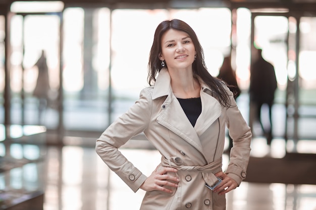 Young business woman on the background of the office