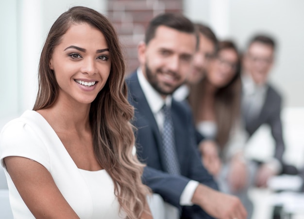 Young business woman on the background of the office