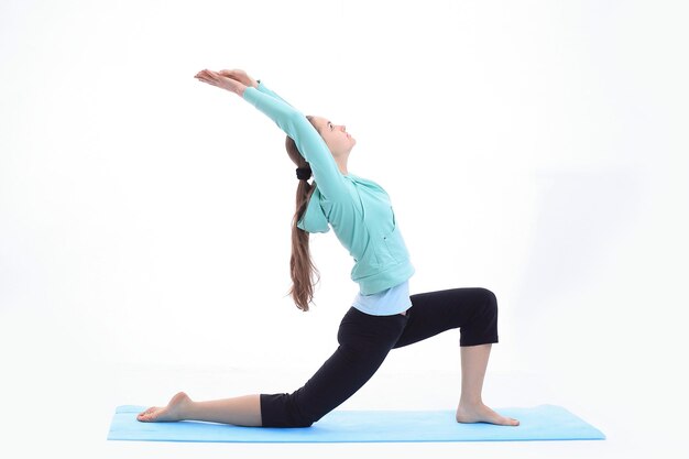 Young business woman doing exercise at the health club