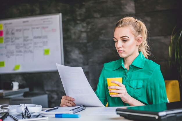 Young business woman doing paperwork