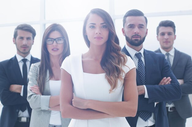 Young business woman in front of the business team the concept of teamwork