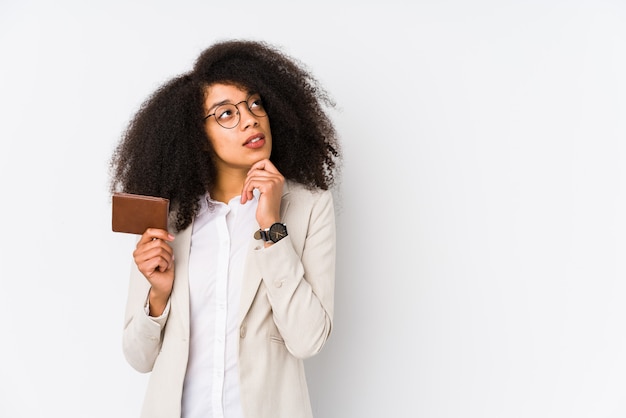 Young business woman holding a credit car