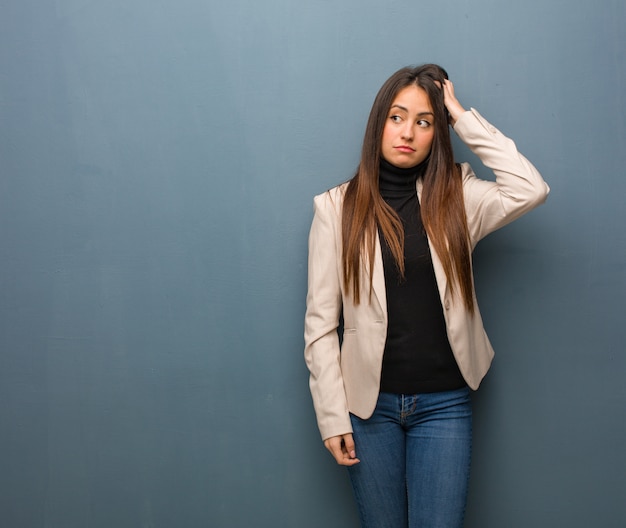 Young business woman tired and very sleepy