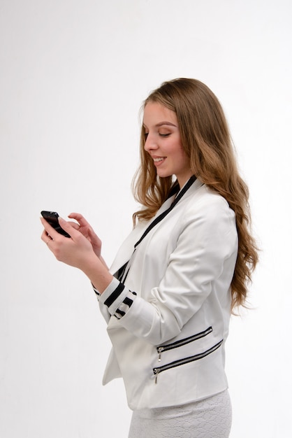 Young business woman using mobile phone phone