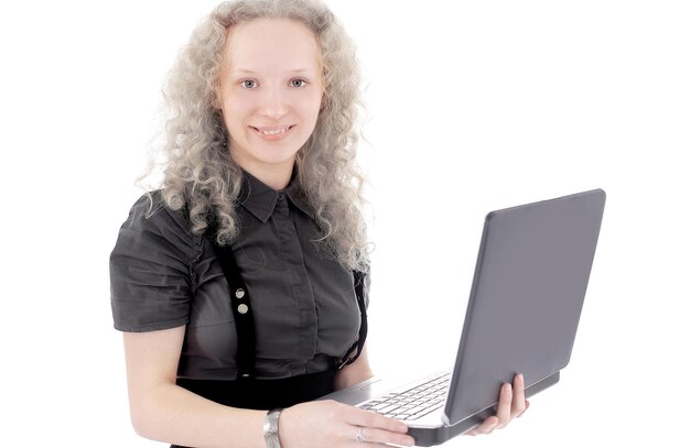 Young business woman working on laptopisolated on white