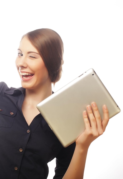 Young business woman working on tablet