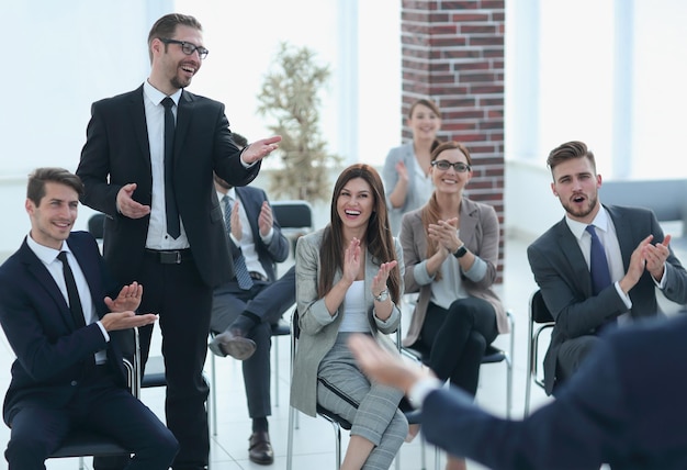 Young businessman asks the speaker at a business meetingbusiness concept