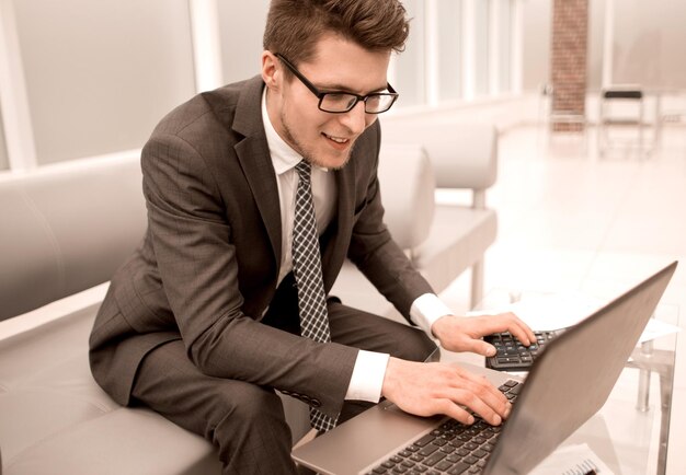 Young businessman checking financial reportphoto with copy space