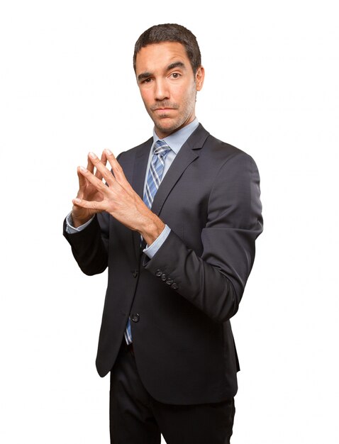 Young businessman doing a concentration gesture