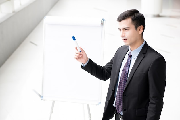 Young businessman giving a presentation