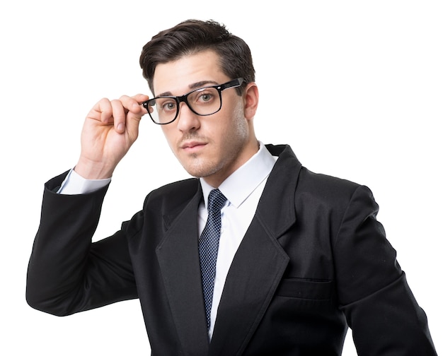 Young businessman in glasses, tie and black suit, isolated on white