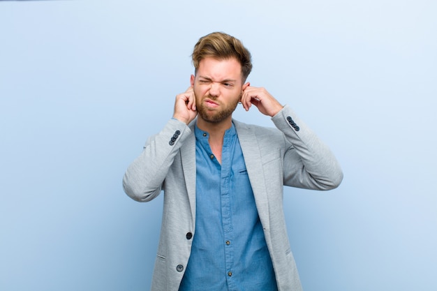 Young businessman looking angry