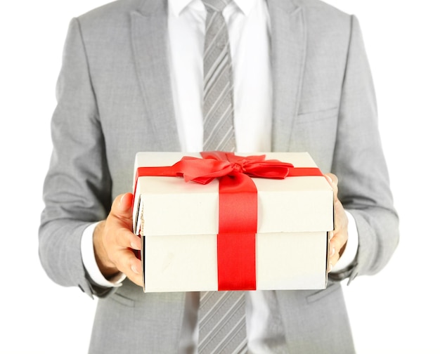 Young businessman present gift box, isolated on white