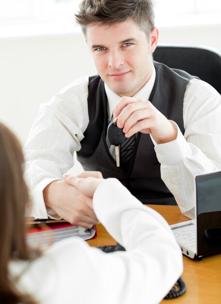 Young businessman shaking hands