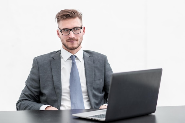 Young businessman sitting at the Desk