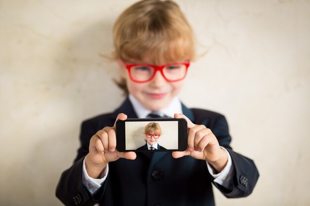 Young businessman taking selfie Success concept