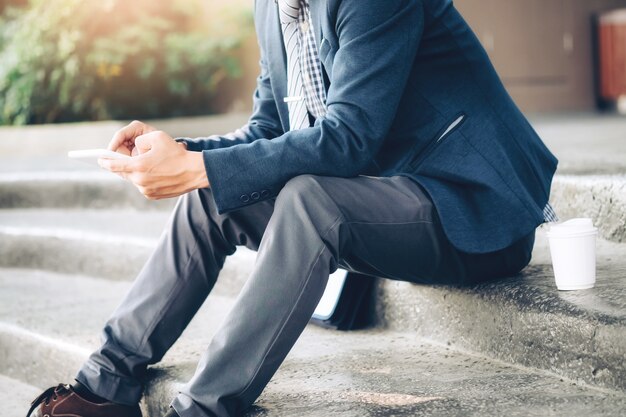 Young businessman using tablet. 