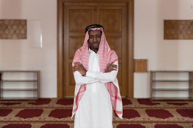 Young Businessman Wearing A Traditional Cap Dishdasha