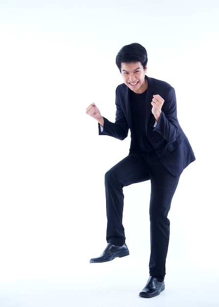 Young businessman on white background