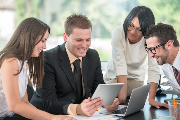 Young businessman with colleagues