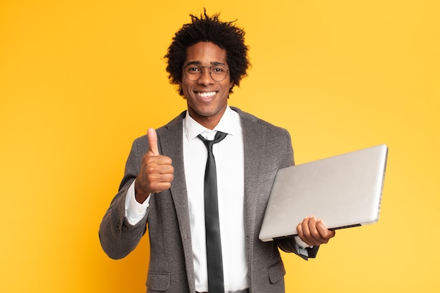 Young businessman with a laptop