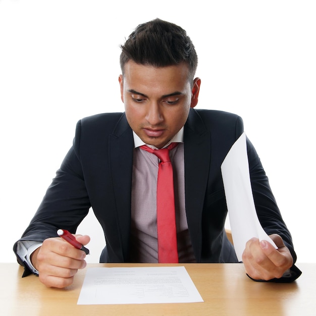 Young businessman with paperwork