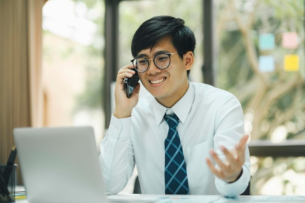 Young businessman work using laptop