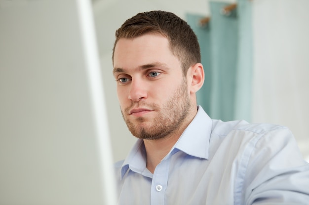 Young businessman working on his laptop